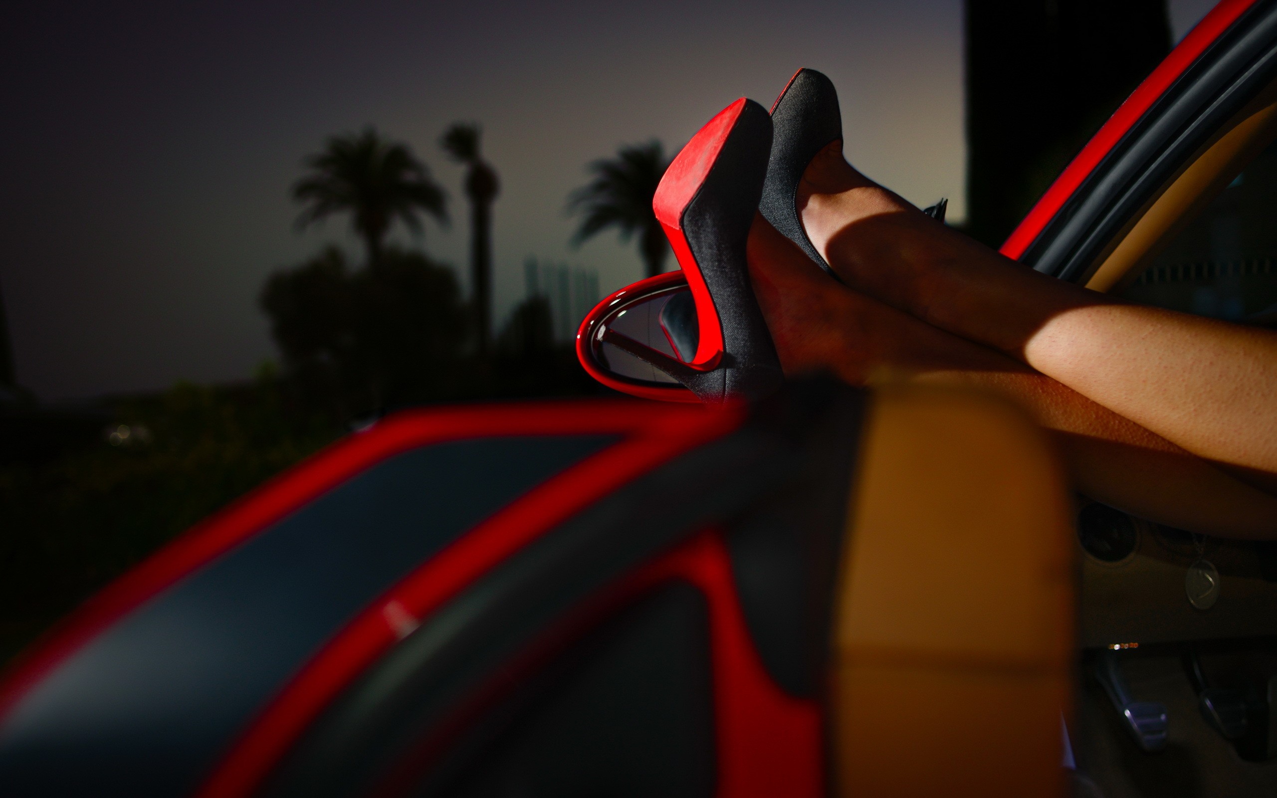 louboutin wallpaper,red,automotive design,light,vehicle,automotive lighting