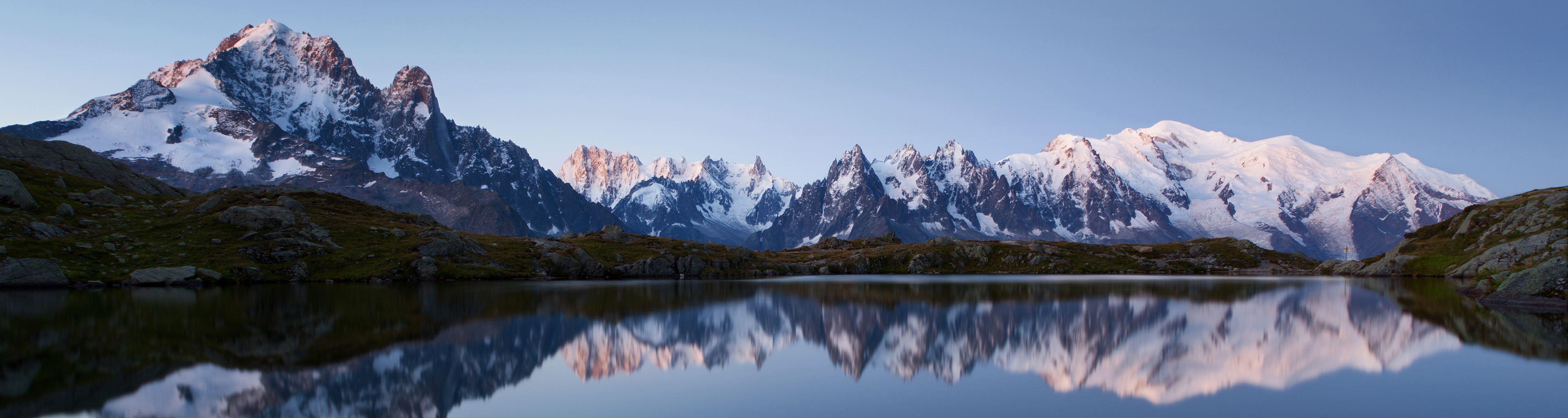 three screen wallpaper,mountainous landforms,mountain,natural landscape,mountain range,reflection