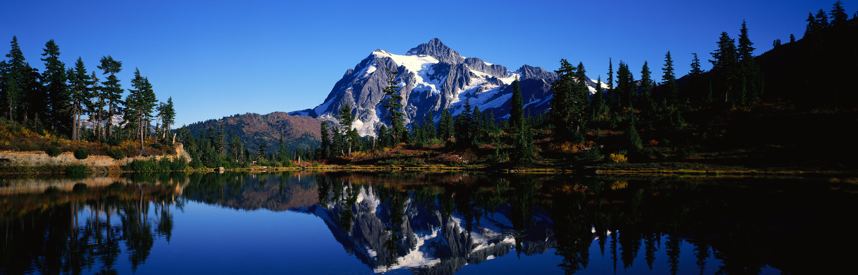 panoramic desktop wallpaper dual monitors,mountain,reflection,natural landscape,mountainous landforms,nature