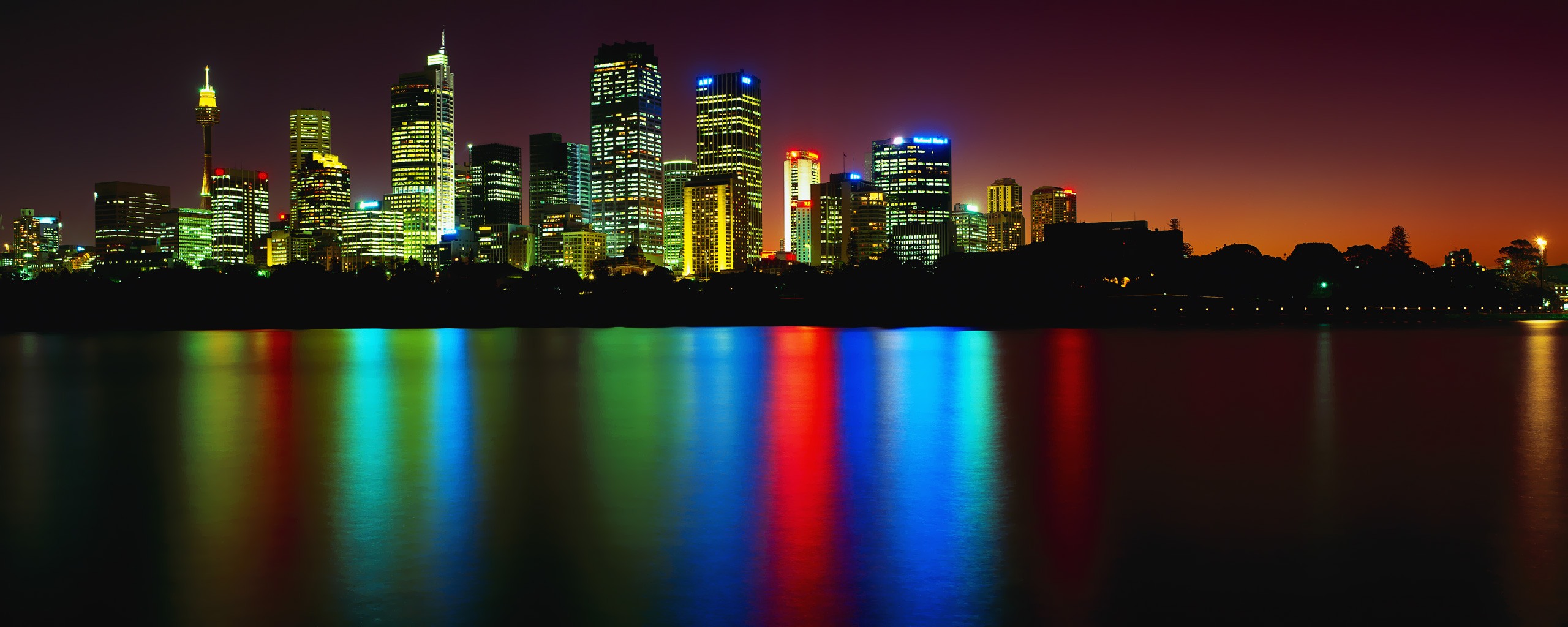 panoramic desktop wallpaper dual monitors,cityscape,city,metropolitan area,skyline,reflection