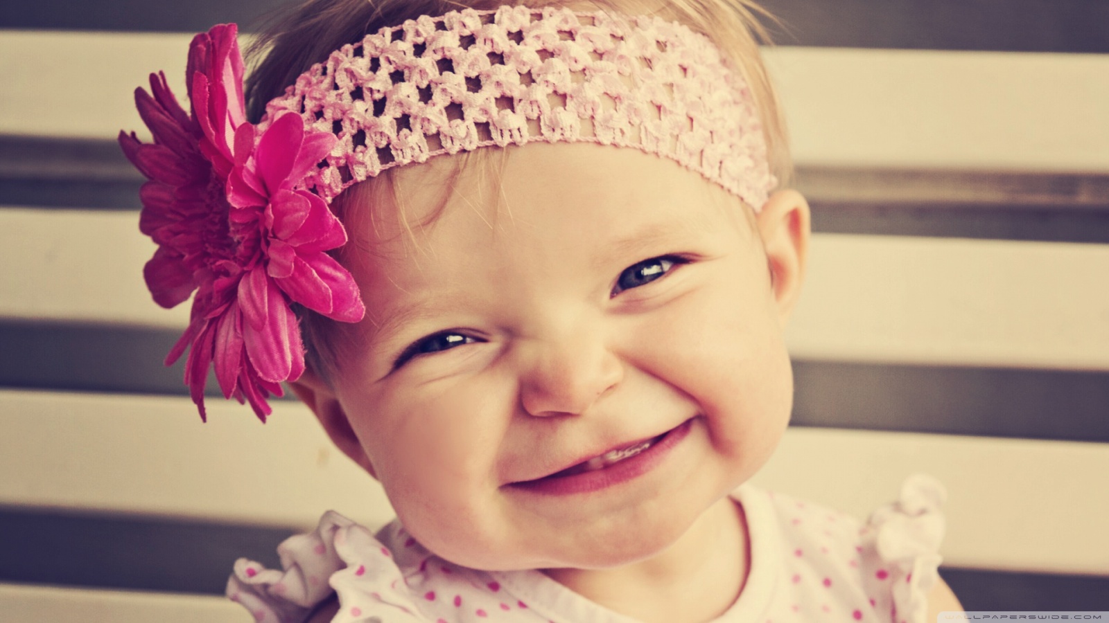 smile baby wallpaper,face,child,facial expression,hair accessory,pink