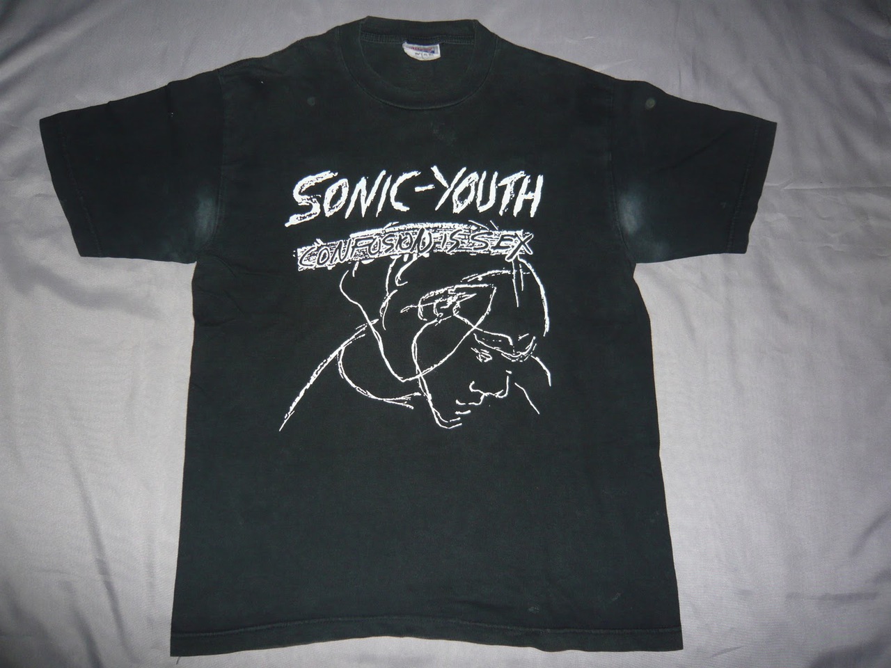 sonic youth wallpaper,t shirt,clothing,black,active shirt,sleeve