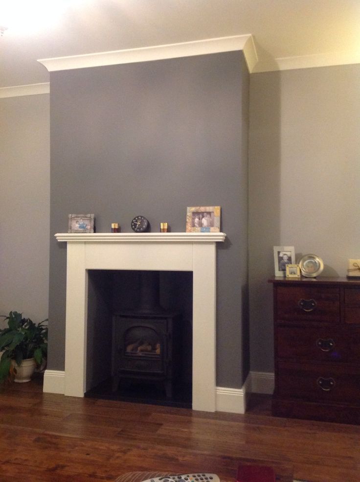 chimney breast wallpaper,hearth,room,fireplace,property,furniture