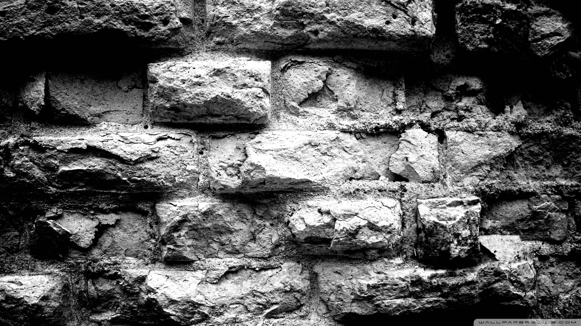 black and white brick wallpaper,rock,wall,photograph,stone wall,black and white