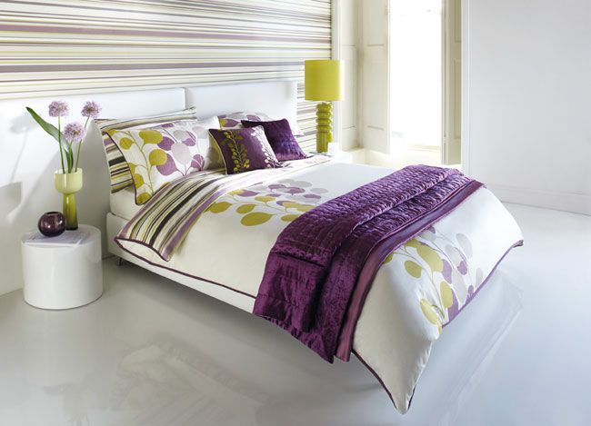 green wallpaper feature wall,bed sheet,bedding,bed,bedroom,purple