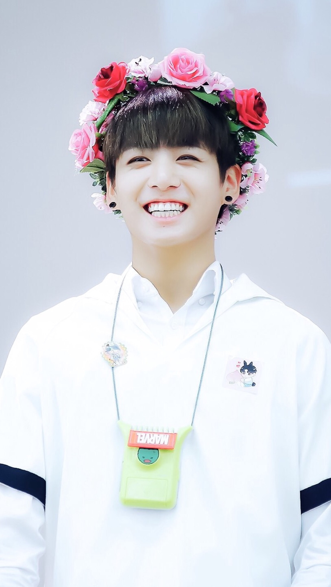jungkook wallpaper hd,hairstyle,smile,hair accessory,headpiece,costume