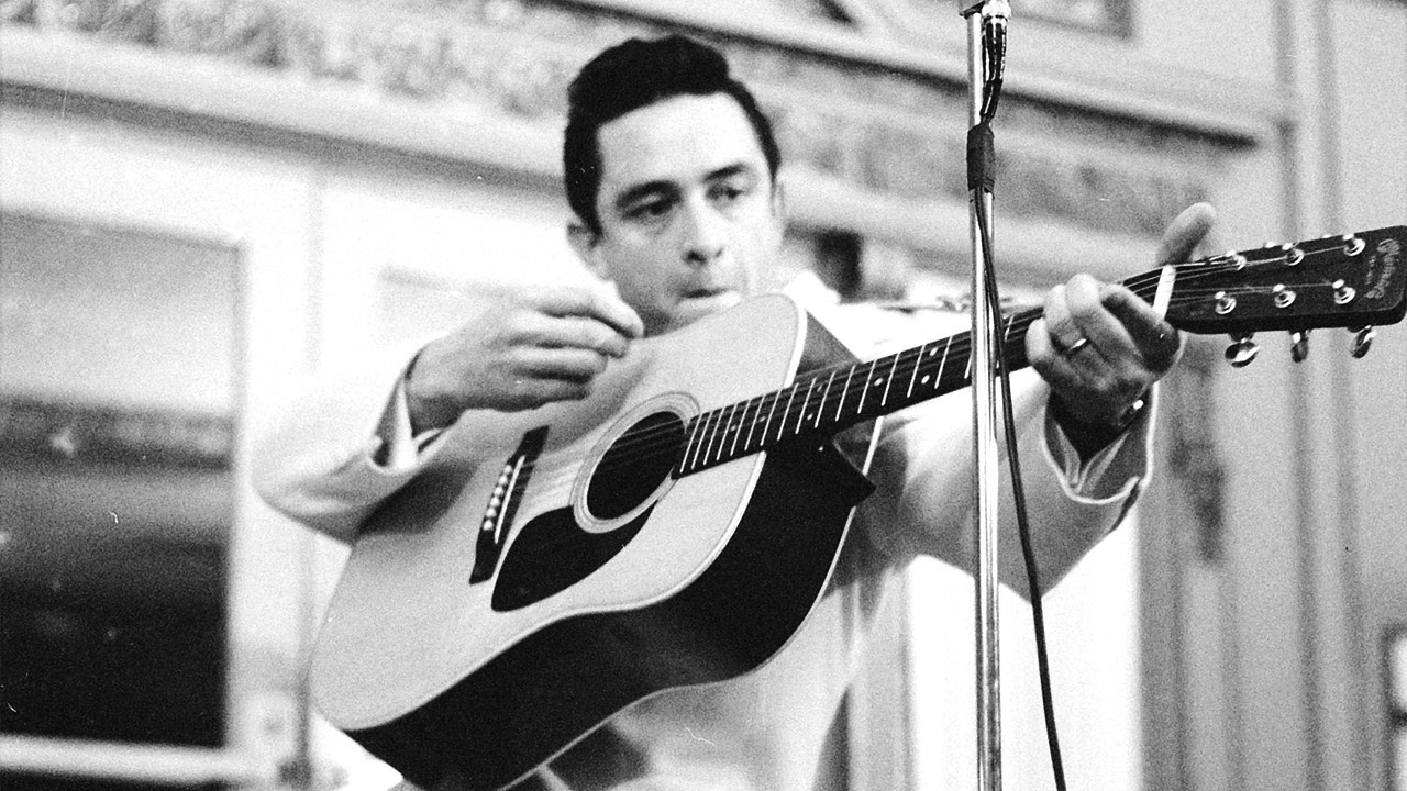 johnny cash iphone wallpaper,guitar,string instrument,string instrument