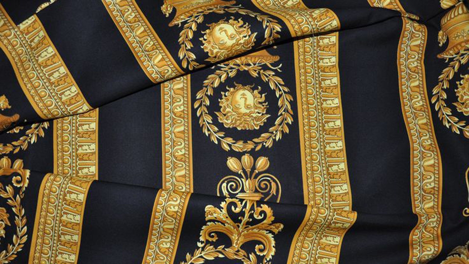 versace wallpaper,textile,room,vestment,pattern,chair