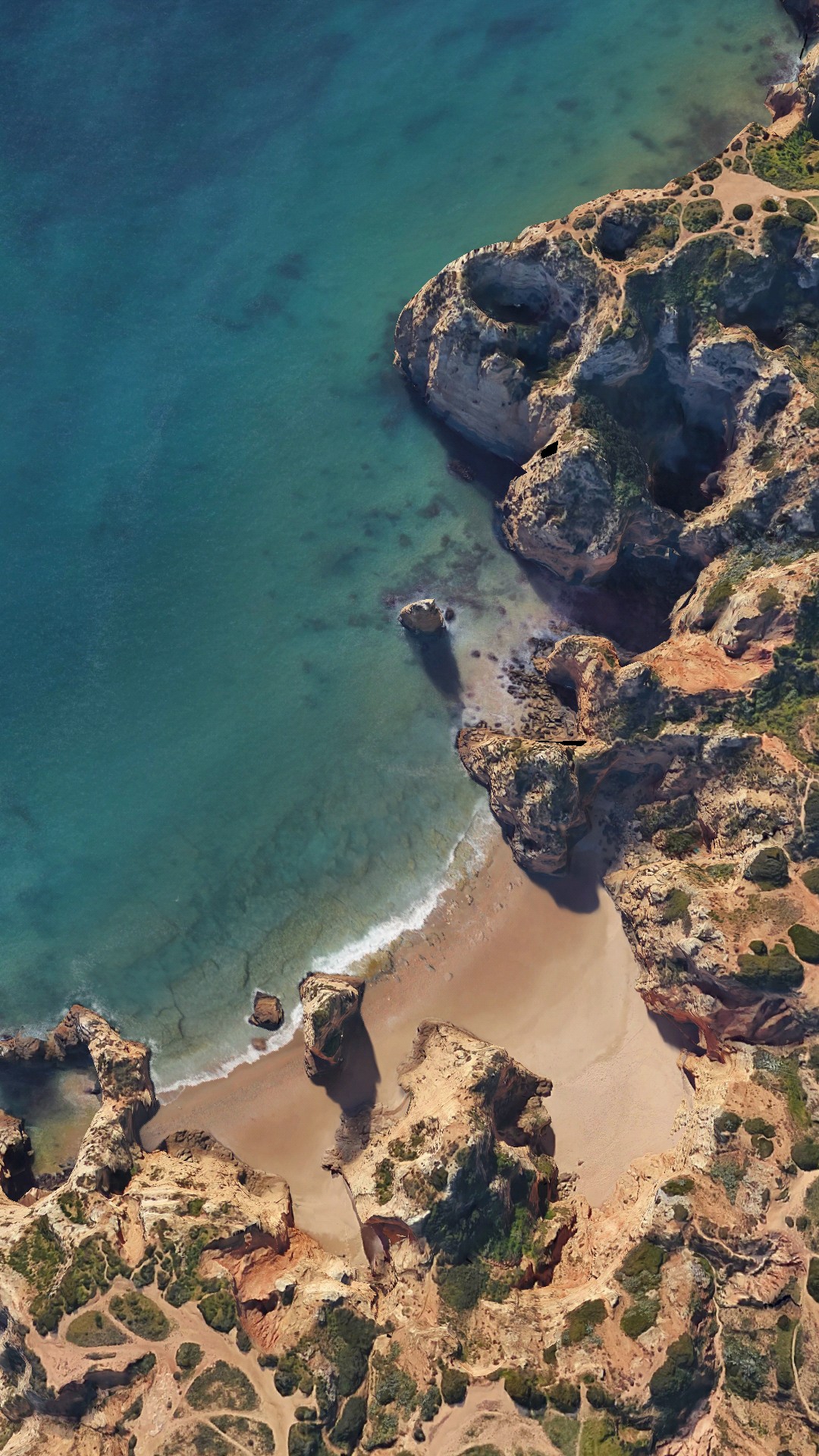 google pixel stock wallpaper,coast,shore,sea,coastal and oceanic landforms,cliff