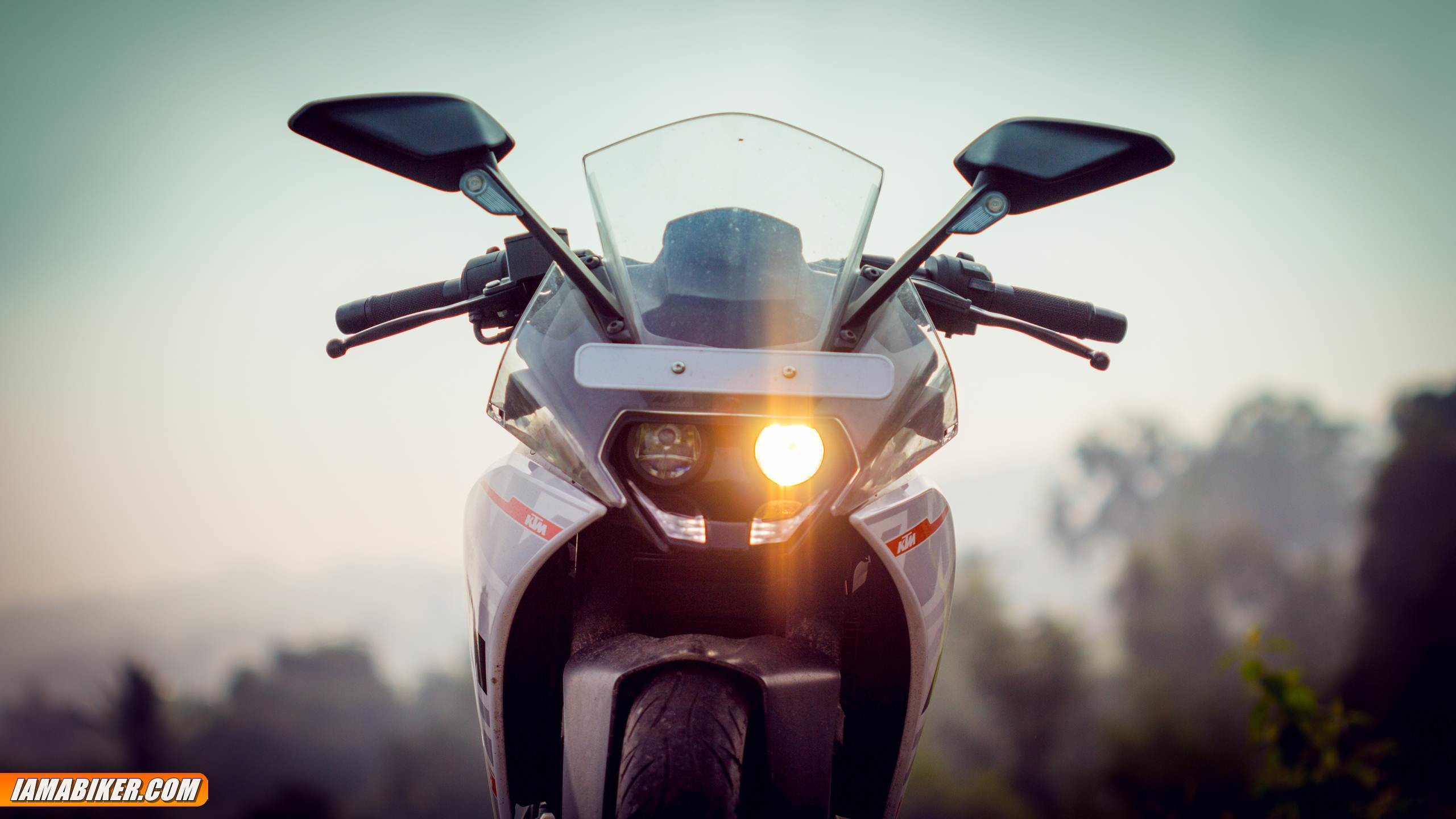 ktm rc 390 hd wallpaper download,vehicle,automotive lighting,headlamp,motorcycle,light