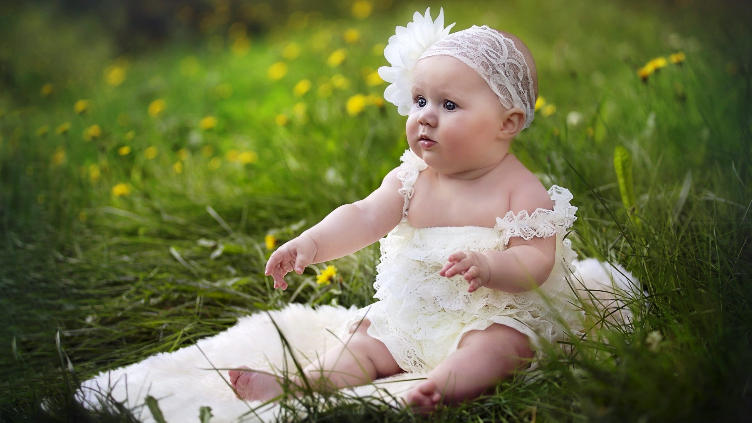 cute baby girl wallpaper,child,people in nature,photograph,grass,skin