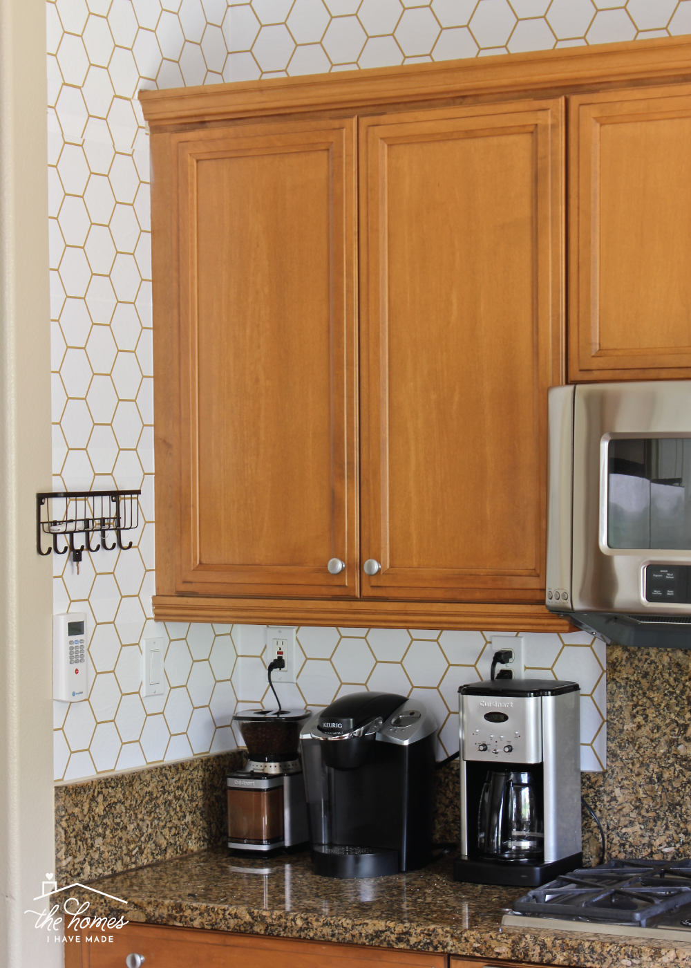 kitchen backsplash wallpaper,countertop,cabinetry,room,kitchen,furniture