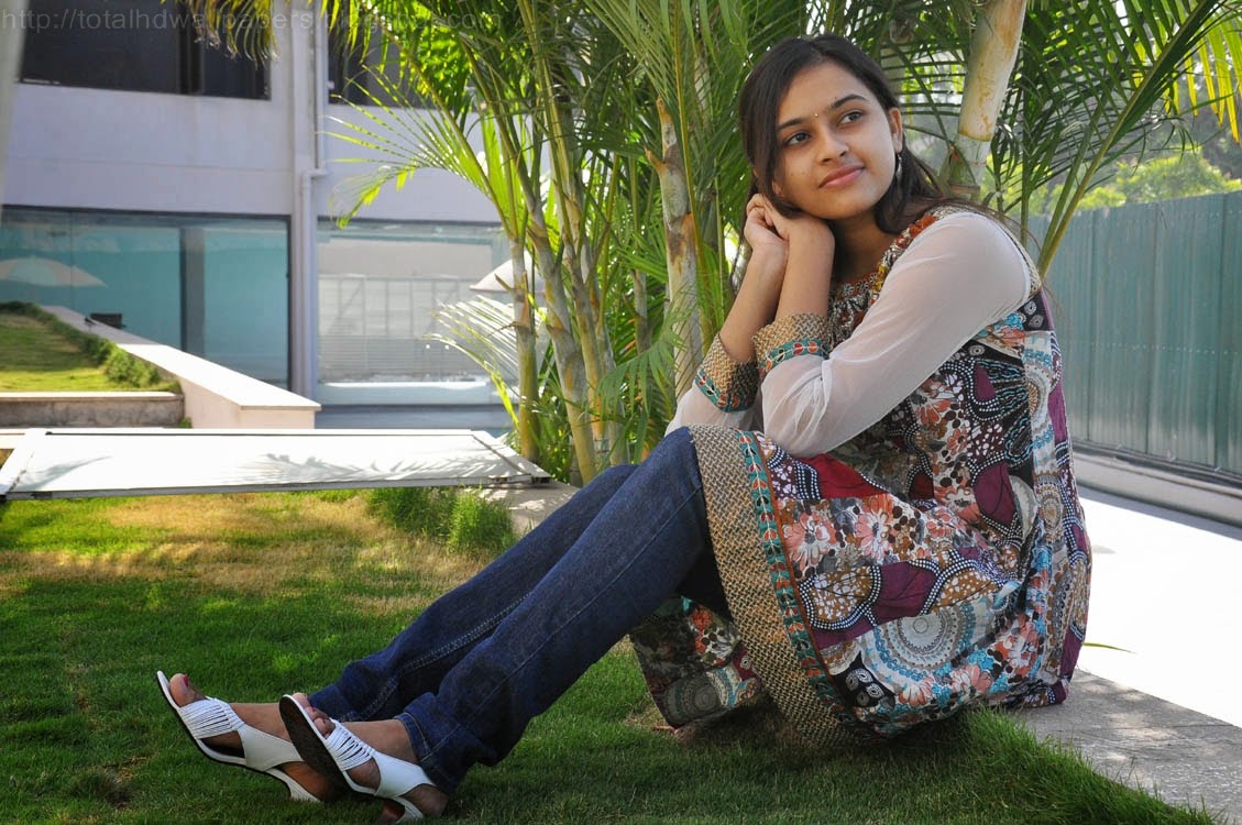 sri divya hd wallpaper,sitting,lawn,grass,beauty,leg