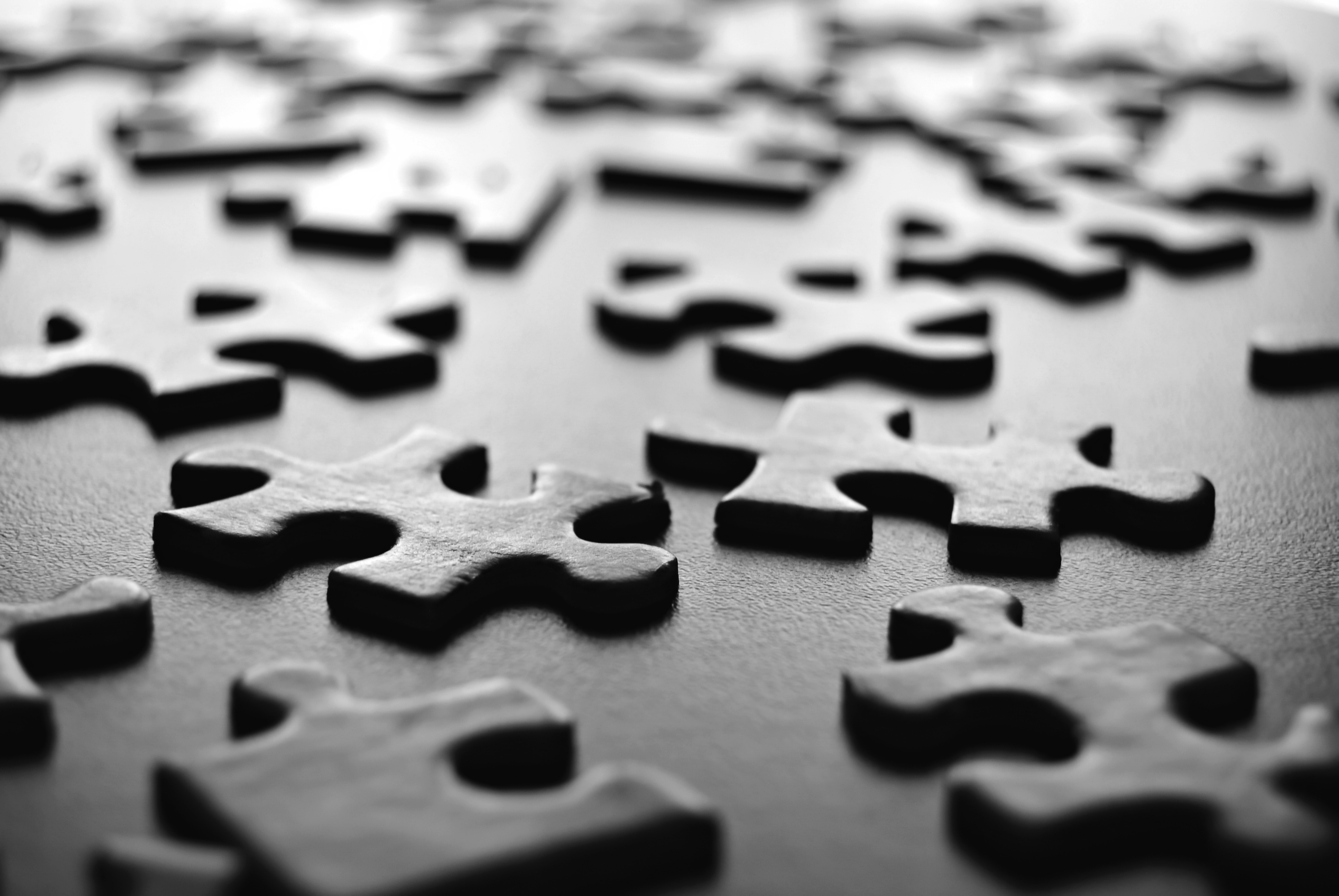 puzzle wallpaper,jigsaw puzzle,puzzle,font,black and white,photography