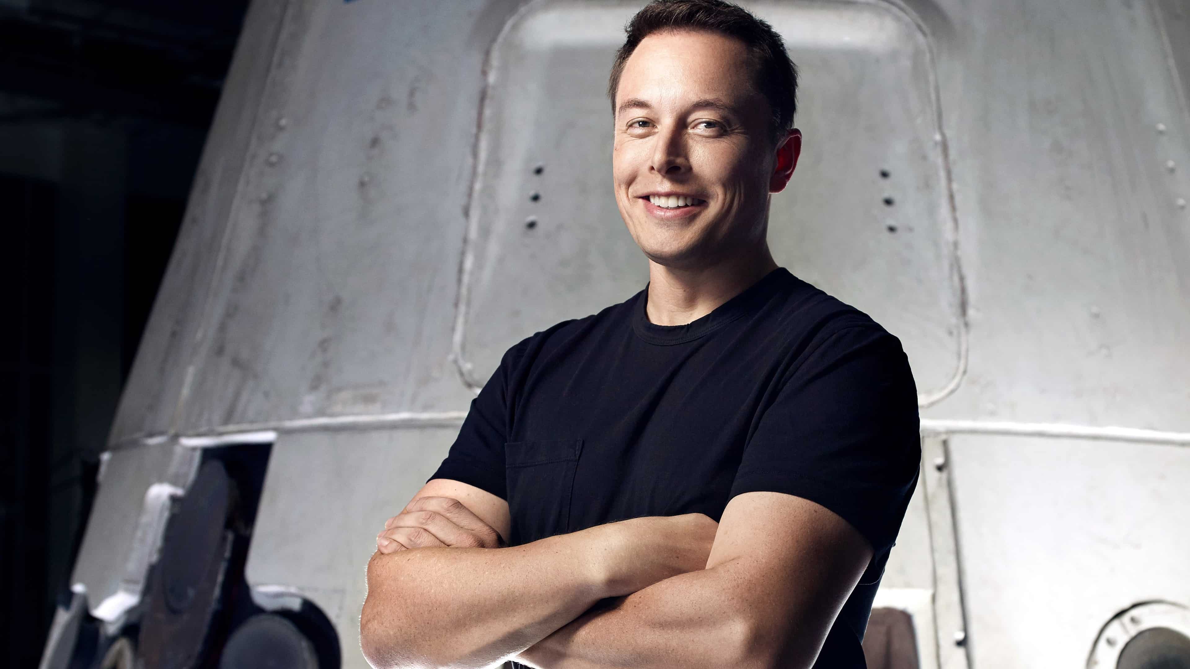 elon musk wallpaper,chin,arm,shoulder,sitting,smile