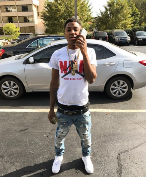 nba youngboy wallpaper,vehicle,car,street fashion,mid size car,family car