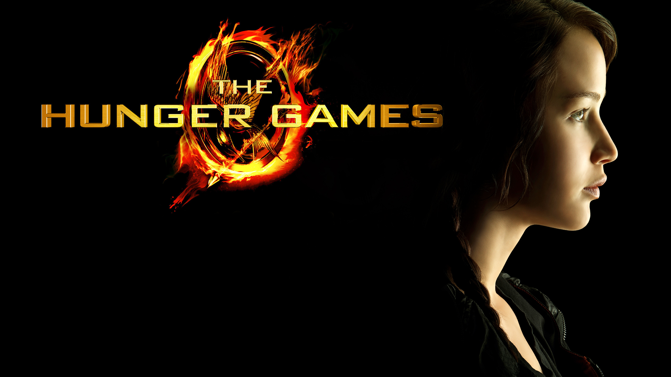 hunger games wallpaper,text,backlighting,album cover,font,mouth