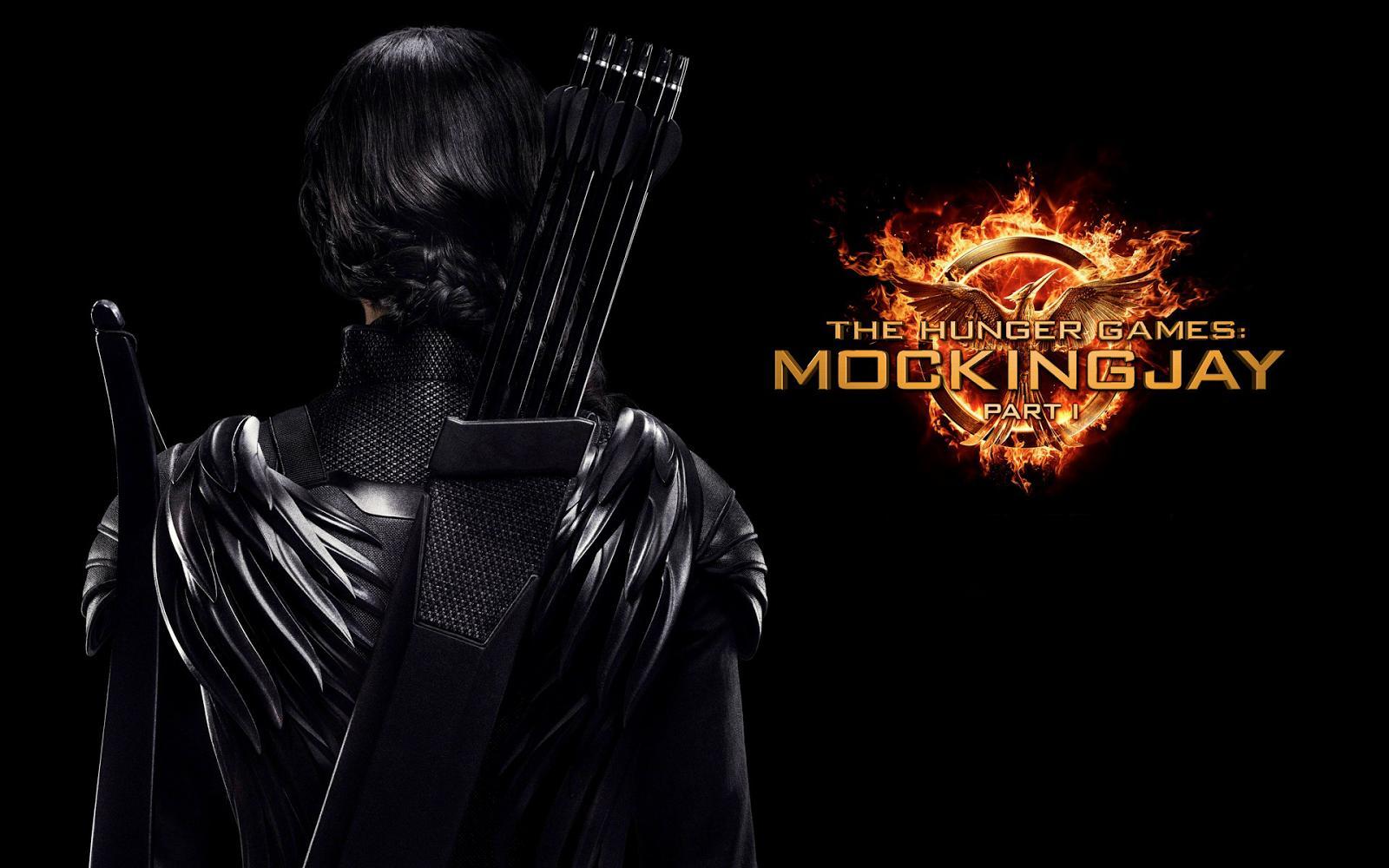 hunger games wallpaper,dunkelheit,grafikdesign,schriftart,oberbekleidung,erfundener charakter